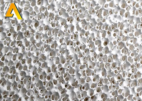 Close-up microstructure of a phosphate-free alumina ceramic foam filter showing uniform open-cell porous structure for molten aluminum filtration