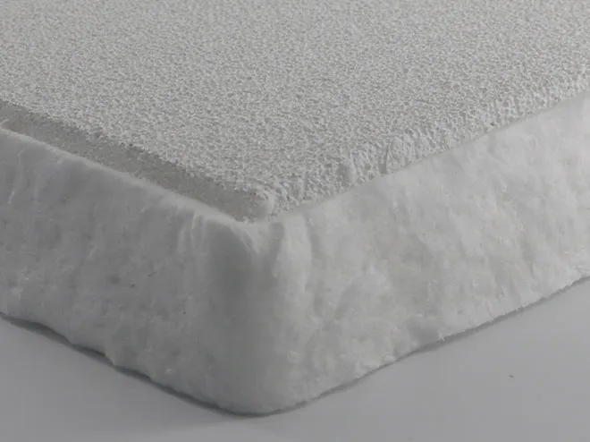 Close-up detail of the expanding fiber gasket edge on a ceramic foam filter, showing the soft, compressible sealing layer designed to ensure a tight fit and prevent molten aluminum bypass during filtration.