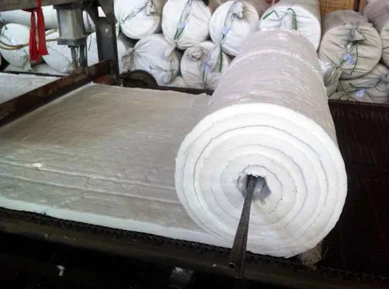Ceramic fiber blanket is being machine packaged into rolls