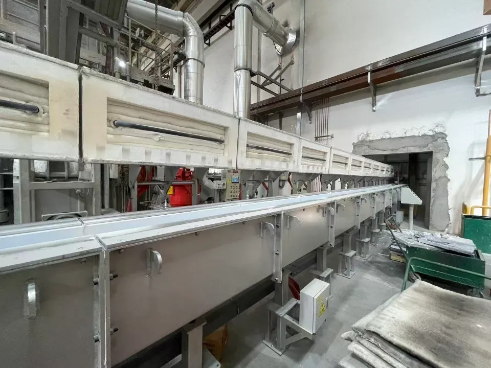 AdTech integrated launder system for molten aluminum in operation at a customer casting site.